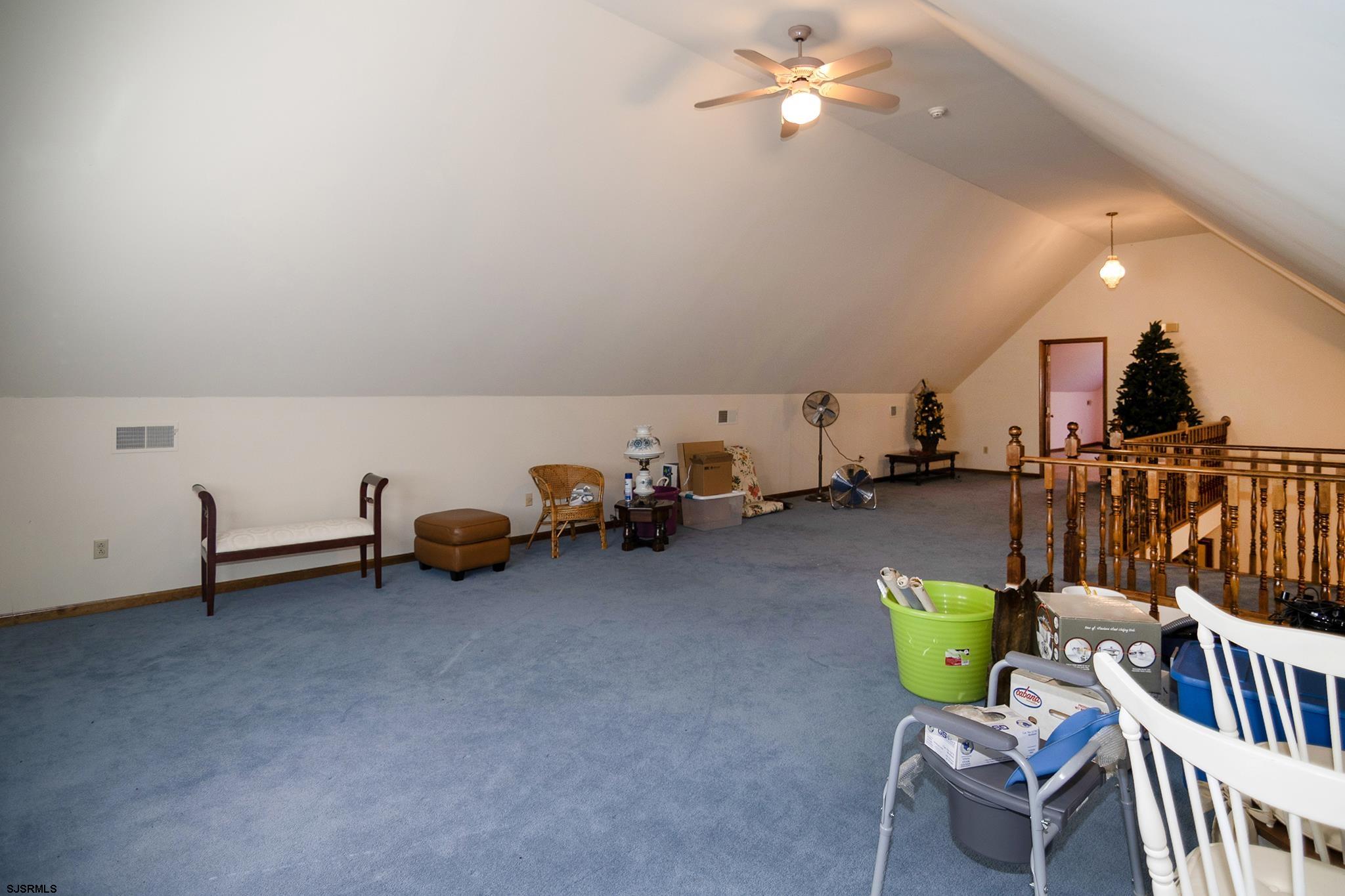 55 Taylor Avenue Milmay, NJ 08340 - Photo 36 of 53 a gym room with furniture and a chandelier