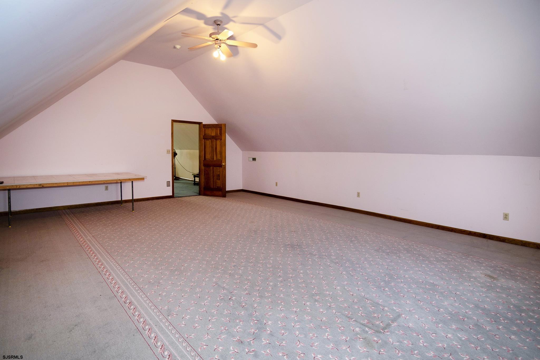 55 Taylor Avenue Milmay, NJ 08340 - Photo 38 of 53 a view of a room with a ceiling fan and a window