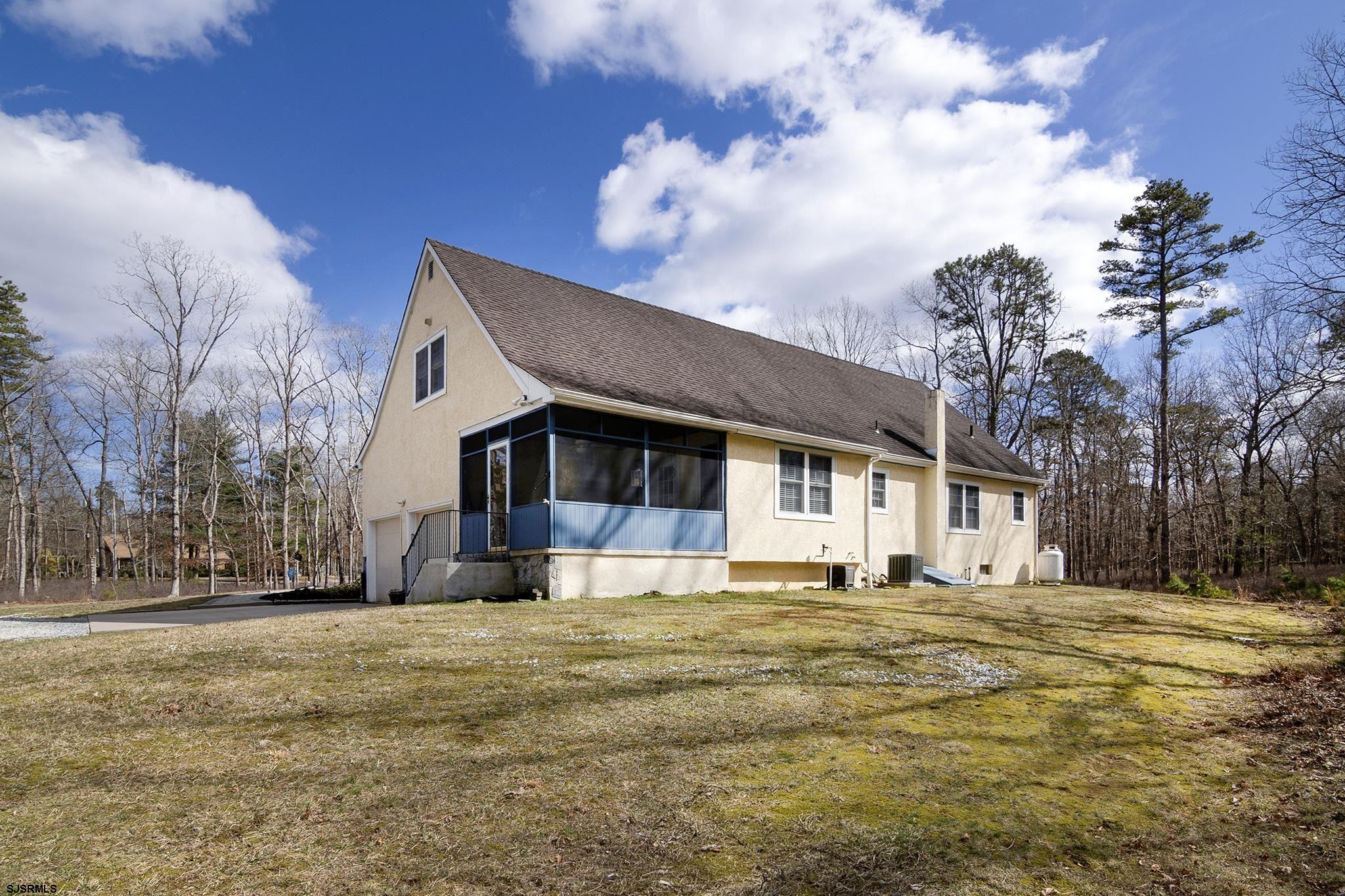 55 Taylor Avenue Milmay, NJ 08340 - Photo 47 of 53 a large house with a big yard plants and large trees