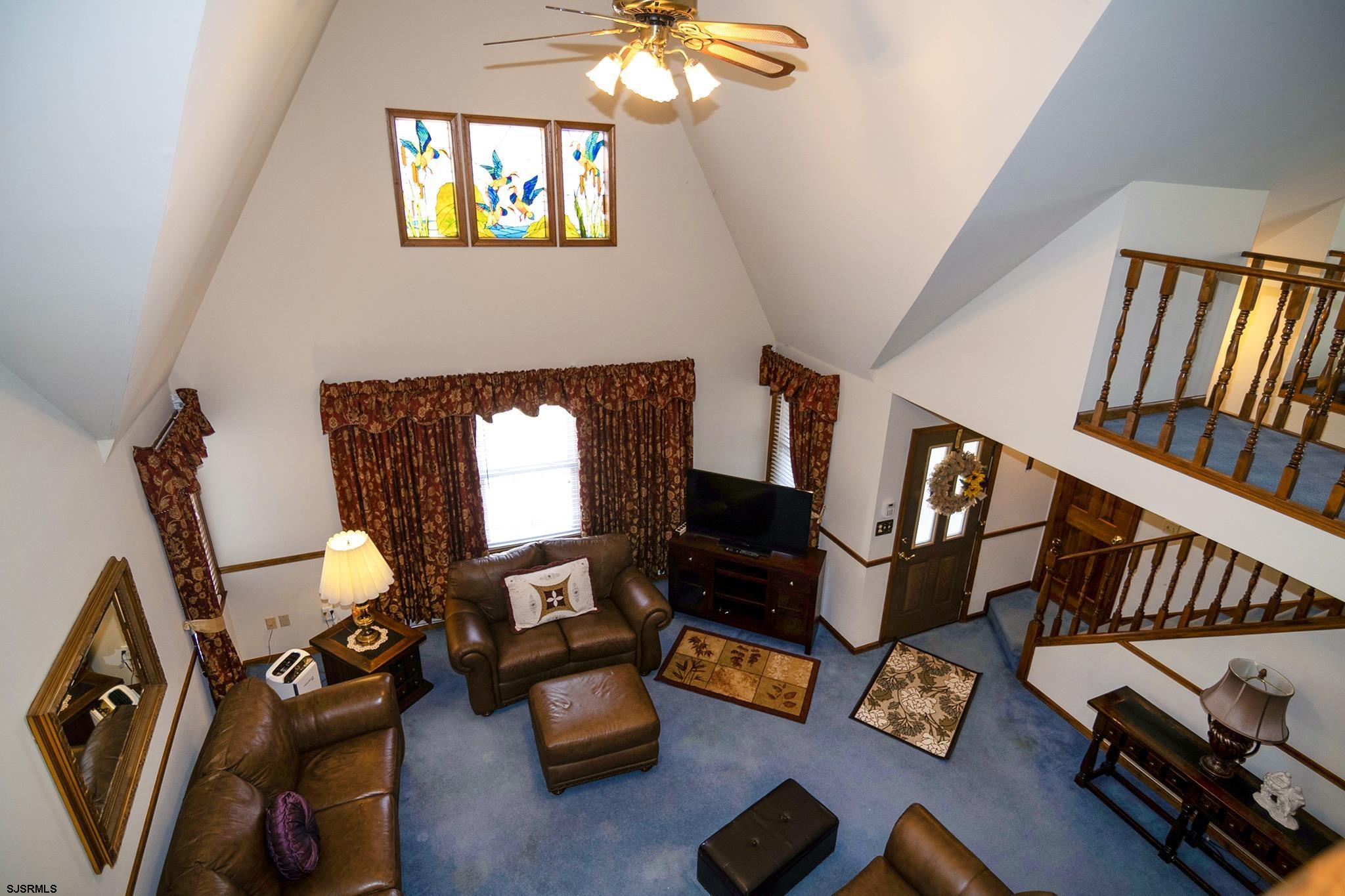 55 Taylor Avenue Milmay, NJ 08340 - Photo 10 of 53 a living room with furniture and a flat screen tv