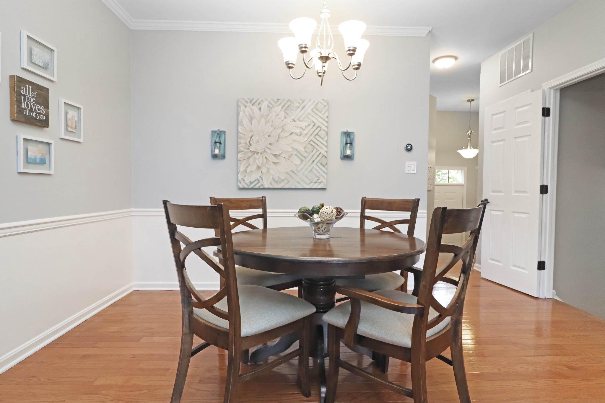 47640 Comer Square Sterling, VA 20165 - Photo 13 of 58 a view of a dining room with furniture and wooden floor