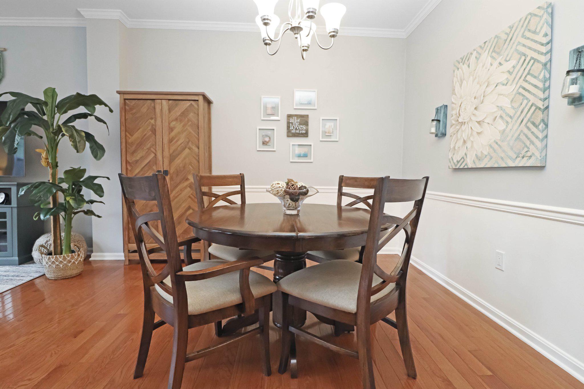 47640 Comer Square Sterling, VA 20165 - Photo 14 of 58 a dining room with furniture and wooden floor