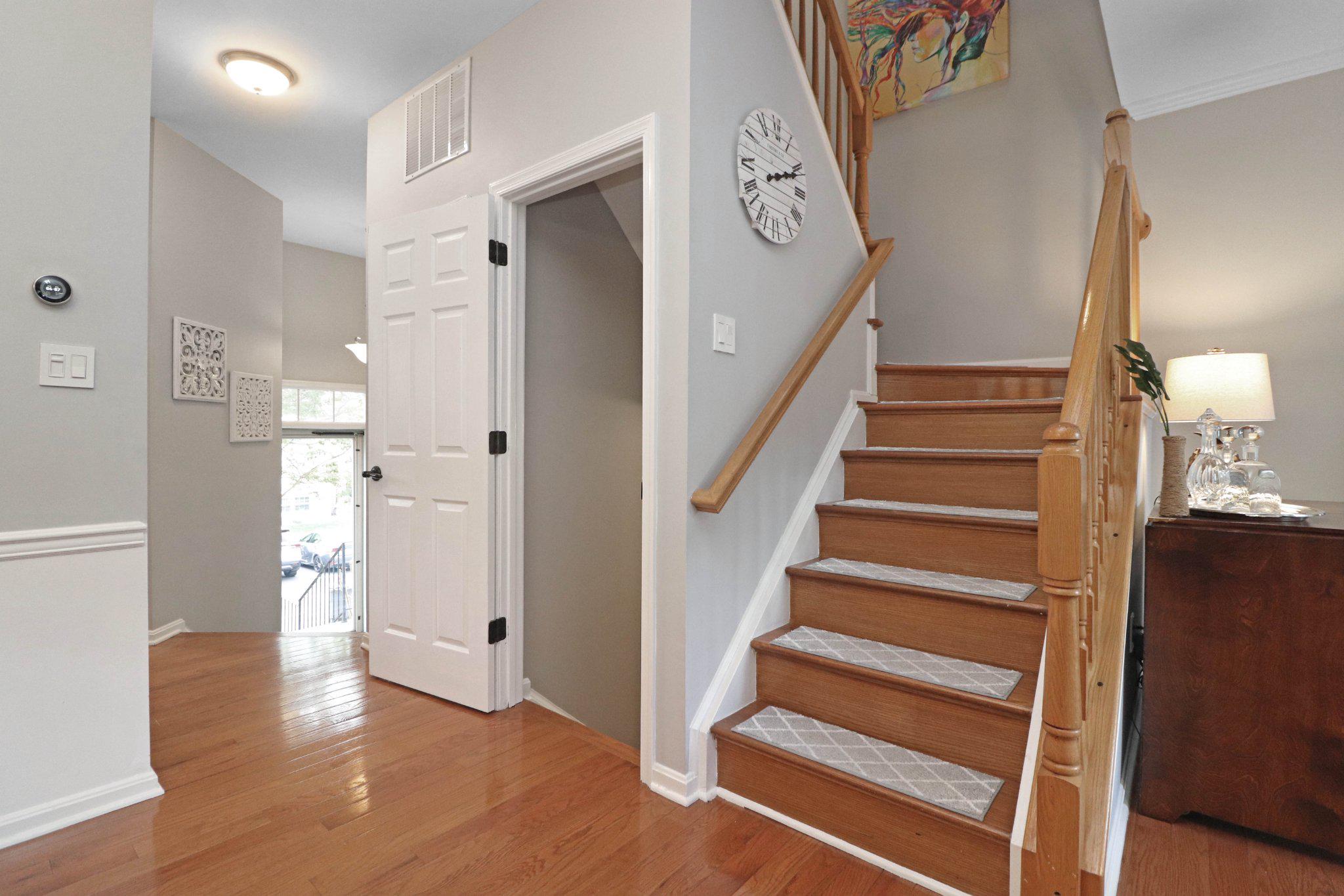 47640 Comer Square Sterling, VA 20165 - Photo 19 of 58 a view of entryway with wooden floor and stairs