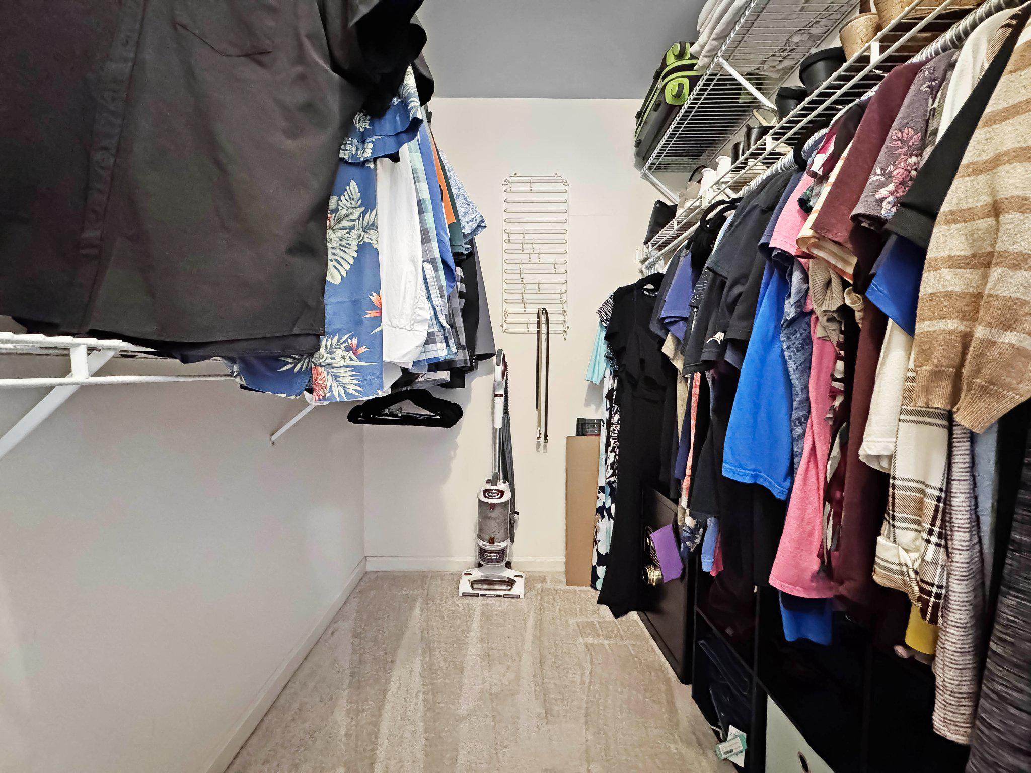 47640 Comer Square Sterling, VA 20165 - Photo 25 of 58 a view of walk in closet with clothes and shoes