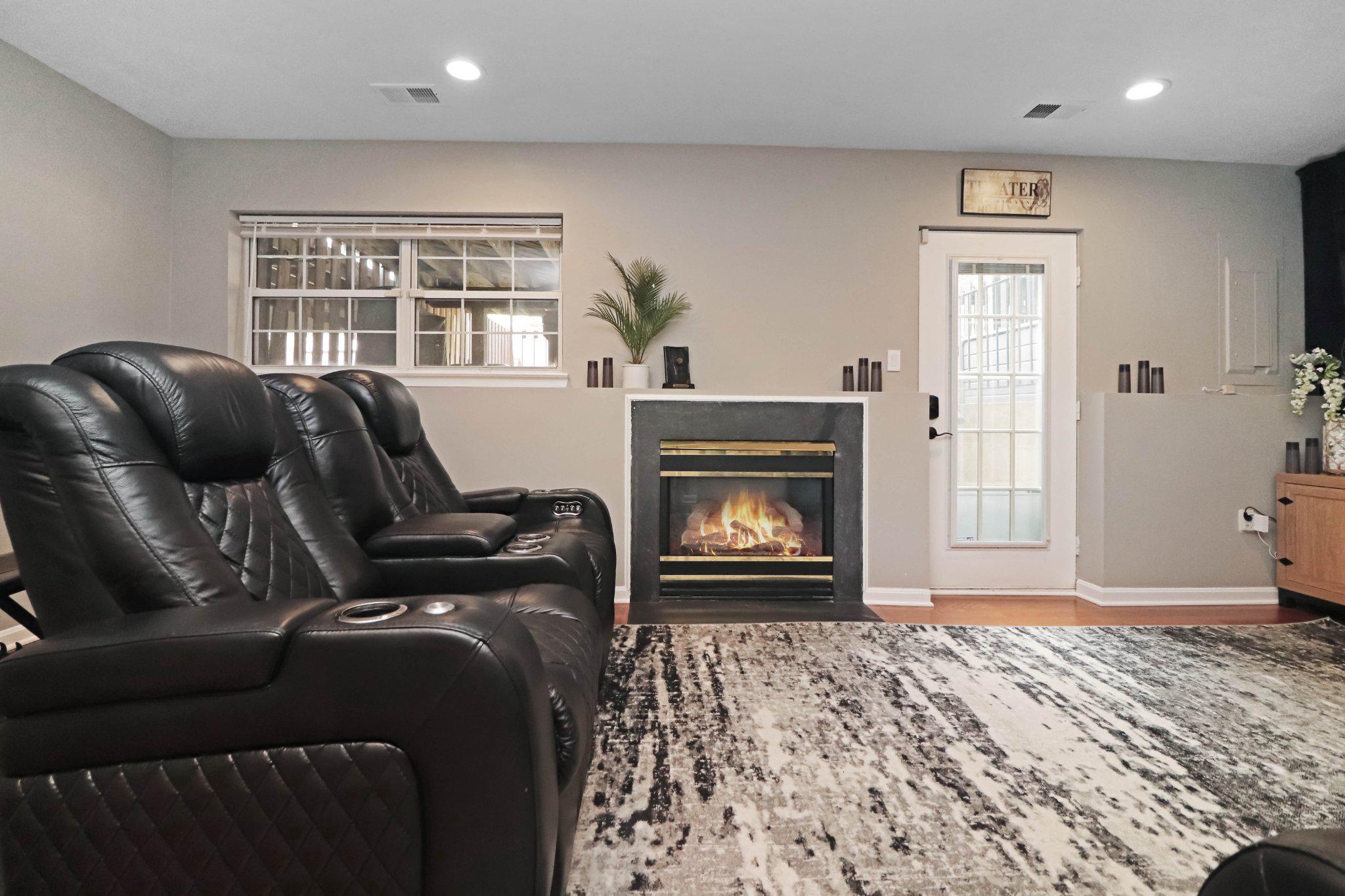 47640 Comer Square Sterling, VA 20165 - Photo 34 of 58 a living room with furniture and a fireplace