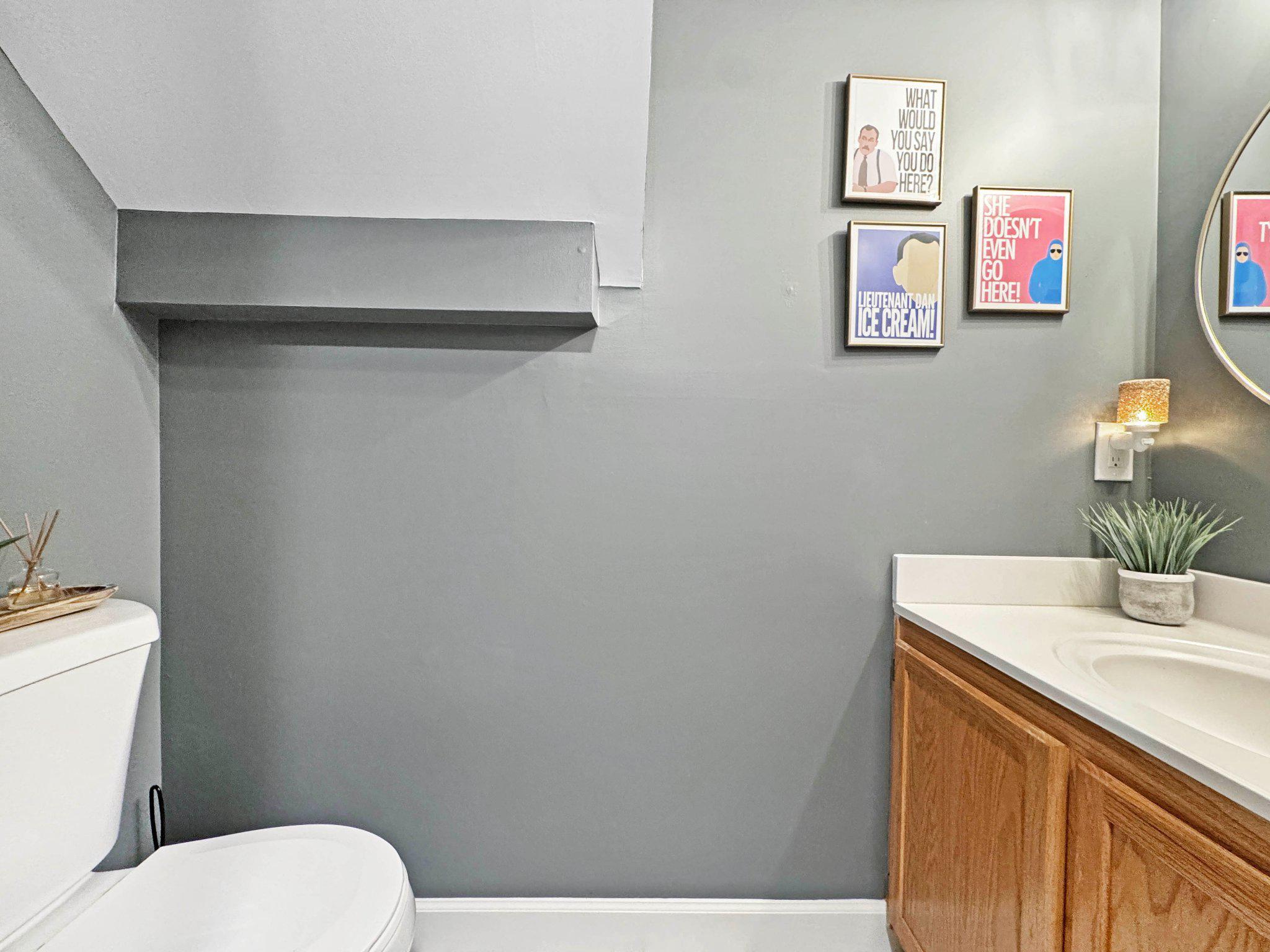47640 Comer Square Sterling, VA 20165 - Photo 35 of 58 a bathroom with a toilet sink and vanity