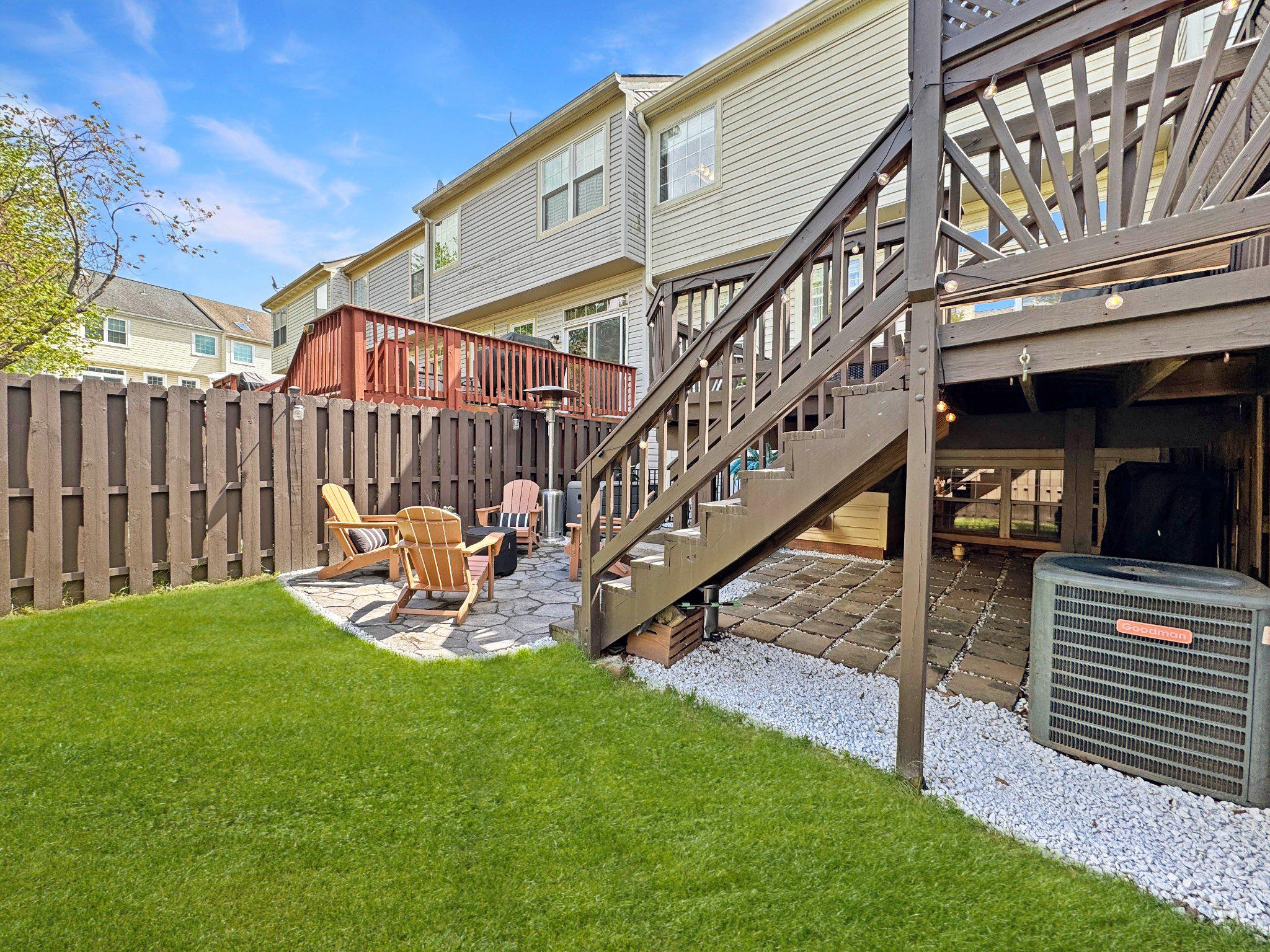 47640 Comer Square Sterling, VA 20165 - Photo 39 of 58 a view of a house with a yard and deck