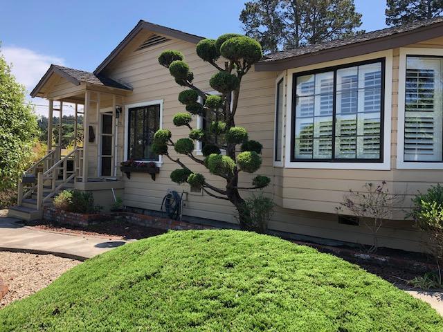 121 Soledad Drive Monterey, CA 93940 - Photo 1 of 14 a front view of a house with garden