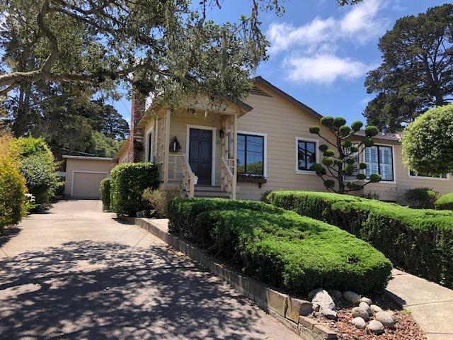 121 Soledad Drive Monterey, CA 93940 - Photo 2 of 14 a front view of house with yard and trees around
