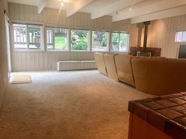 121 Soledad Drive Monterey, CA 93940 - Photo 9 of 14 a living room with furniture and large windows