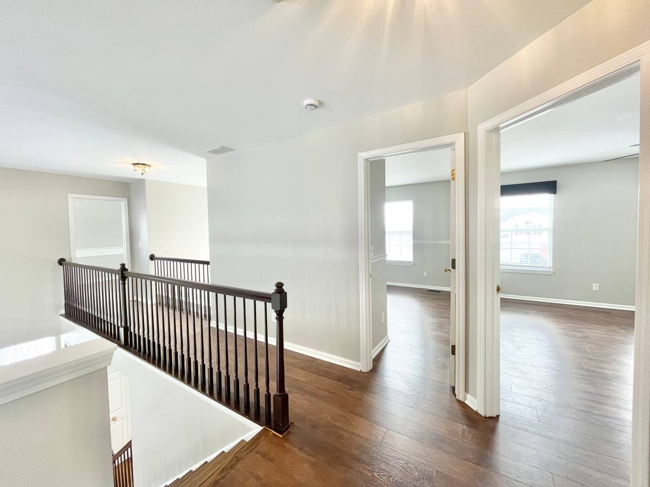 602 Pearces Ford Road Oswego, IL 60543 - Photo 26 of 40 a view of a hallway with wooden floor