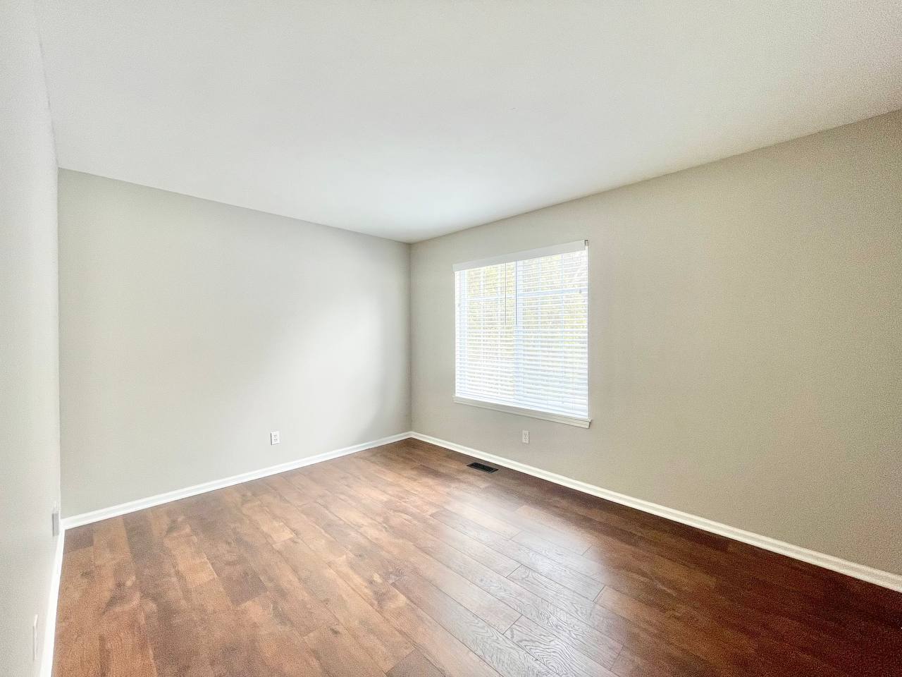 602 Pearces Ford Road Oswego, IL 60543 - Photo 29 of 40 an empty room with wooden floor and windows