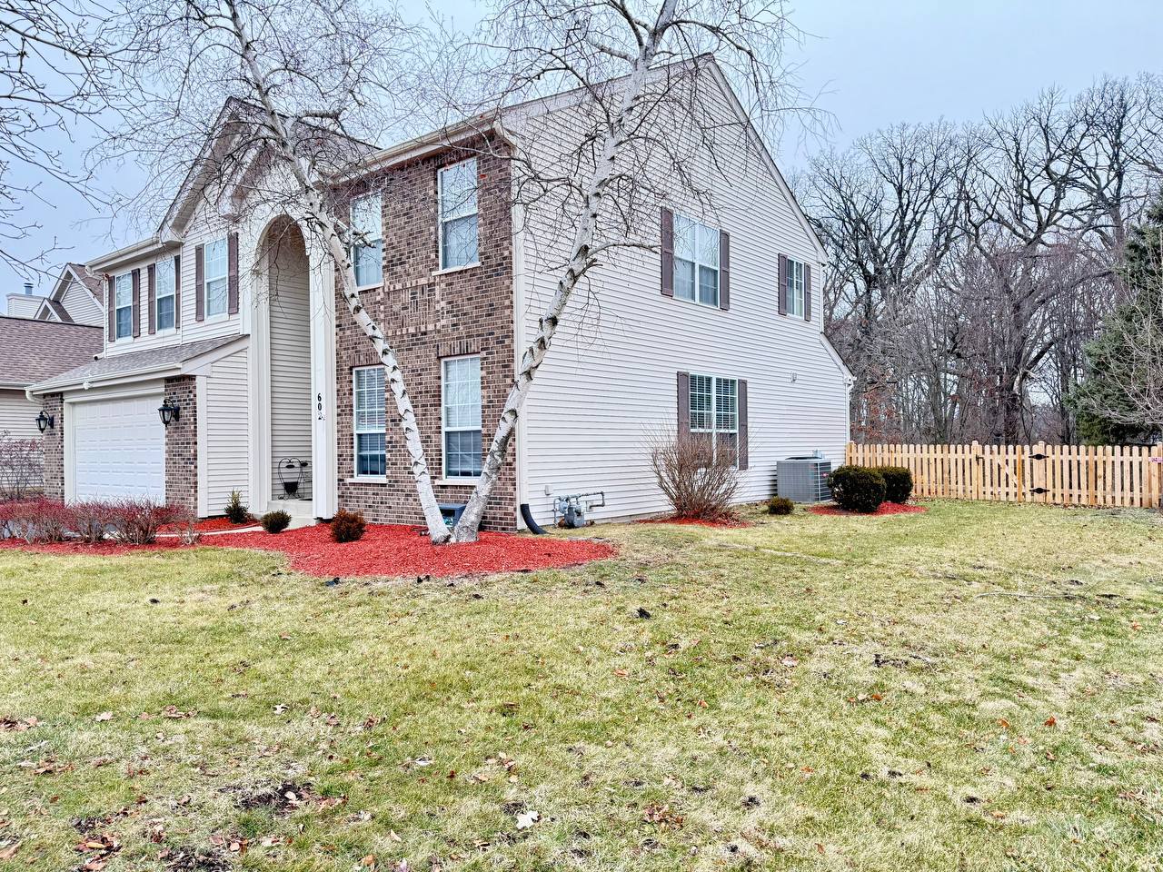 602 Pearces Ford Road Oswego, IL 60543 - Photo 36 of 40 a front view of a house with a yard