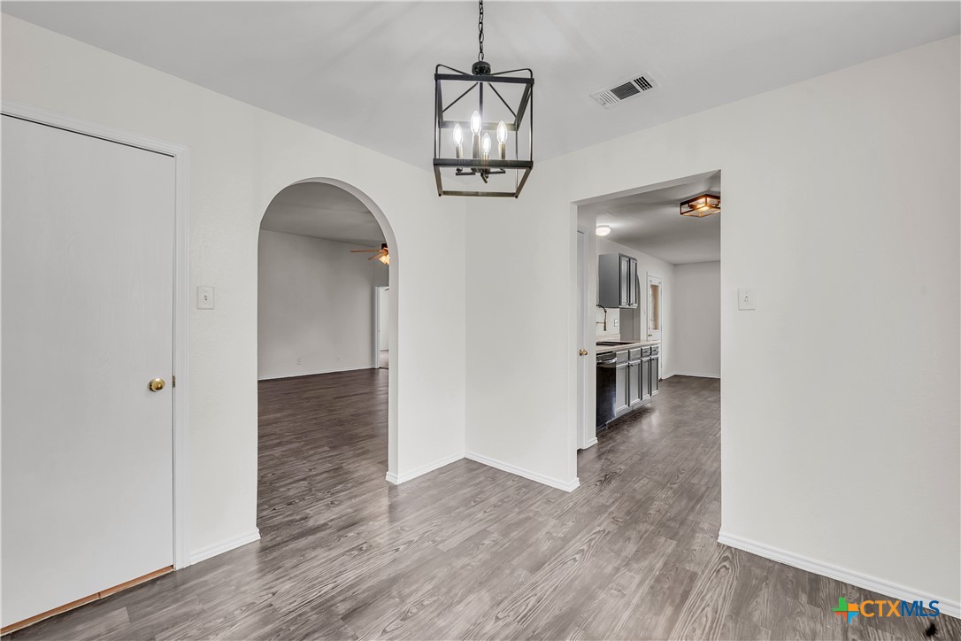 2903 Blue Ridge Drive Killeen, TX 76543 - Photo 11 of 32 a view of a room with wooden floor and hallway