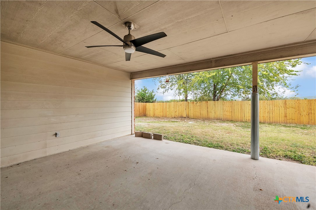 2903 Blue Ridge Drive Killeen, TX 76543 - Photo 30 of 32 a view of an empty room with a window and a ceiling fan