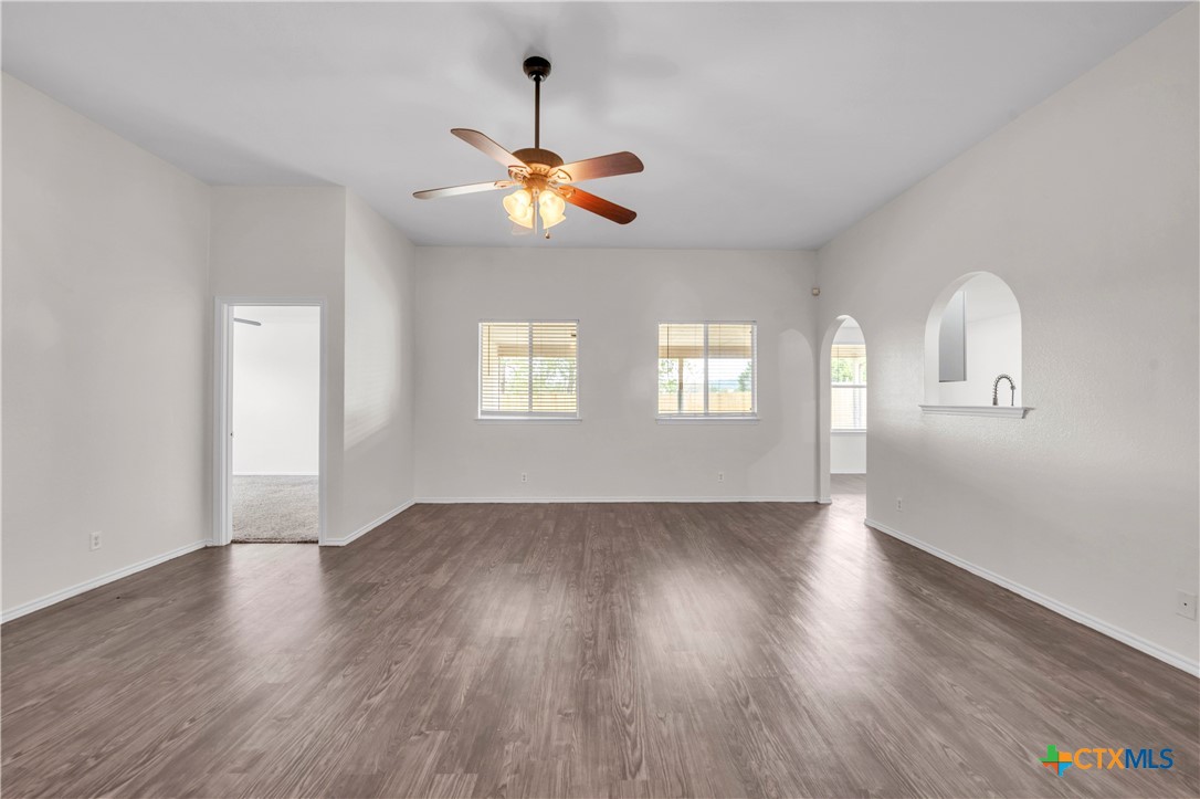 2903 Blue Ridge Drive Killeen, TX 76543 - Photo 7 of 32 a view of an empty room with wooden floor and a window