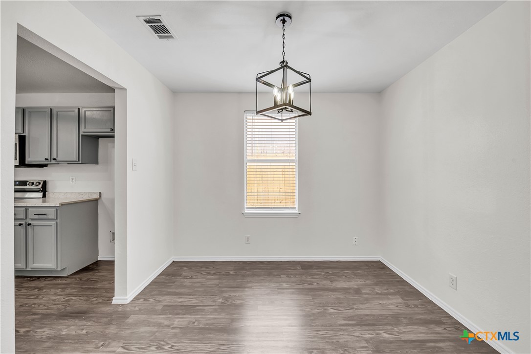2903 Blue Ridge Drive Killeen, TX 76543 - Photo 10 of 32 a view of a kitchen with a sink and dishwasher a window