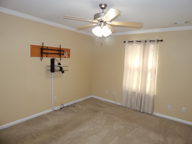 855 Louie Lane Seneca, SC 29678 - Photo 27 of 33 This spacious bedroom offers comfortable carpeting and a bright window for natural light.
