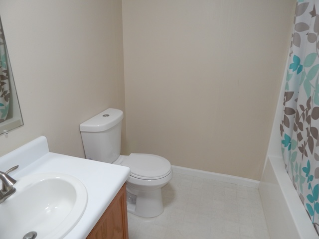 855 Louie Lane Seneca, SC 29678 - Photo 31 of 33 This bathroom features a sleek vanity and essential fixtures, perfect for daily routines.