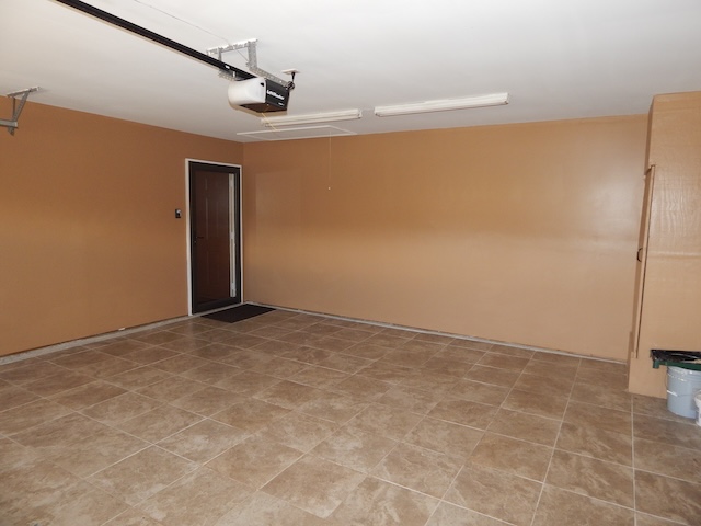 855 Louie Lane Seneca, SC 29678 - Photo 33 of 33 This spacious garage offers versatile space and a durable tile floor.