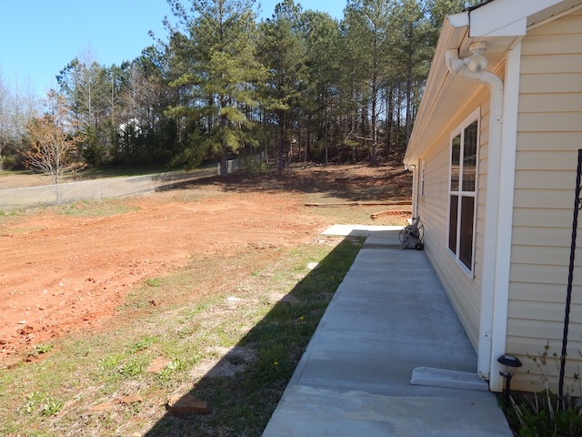 855 Louie Lane Seneca, SC 29678 - Photo 6 of 33 This residence features durable siding and a spacious outdoor area, ideal for relaxed living.