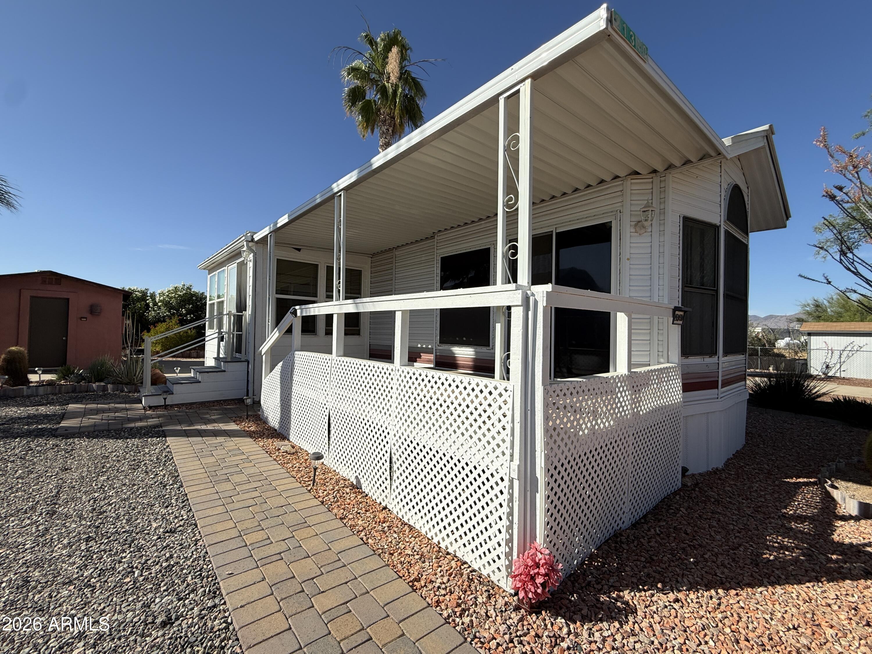 21340 Trading Post Trail Congress, AZ 85332 - Photo 30 of 31 a view of a house with a yard