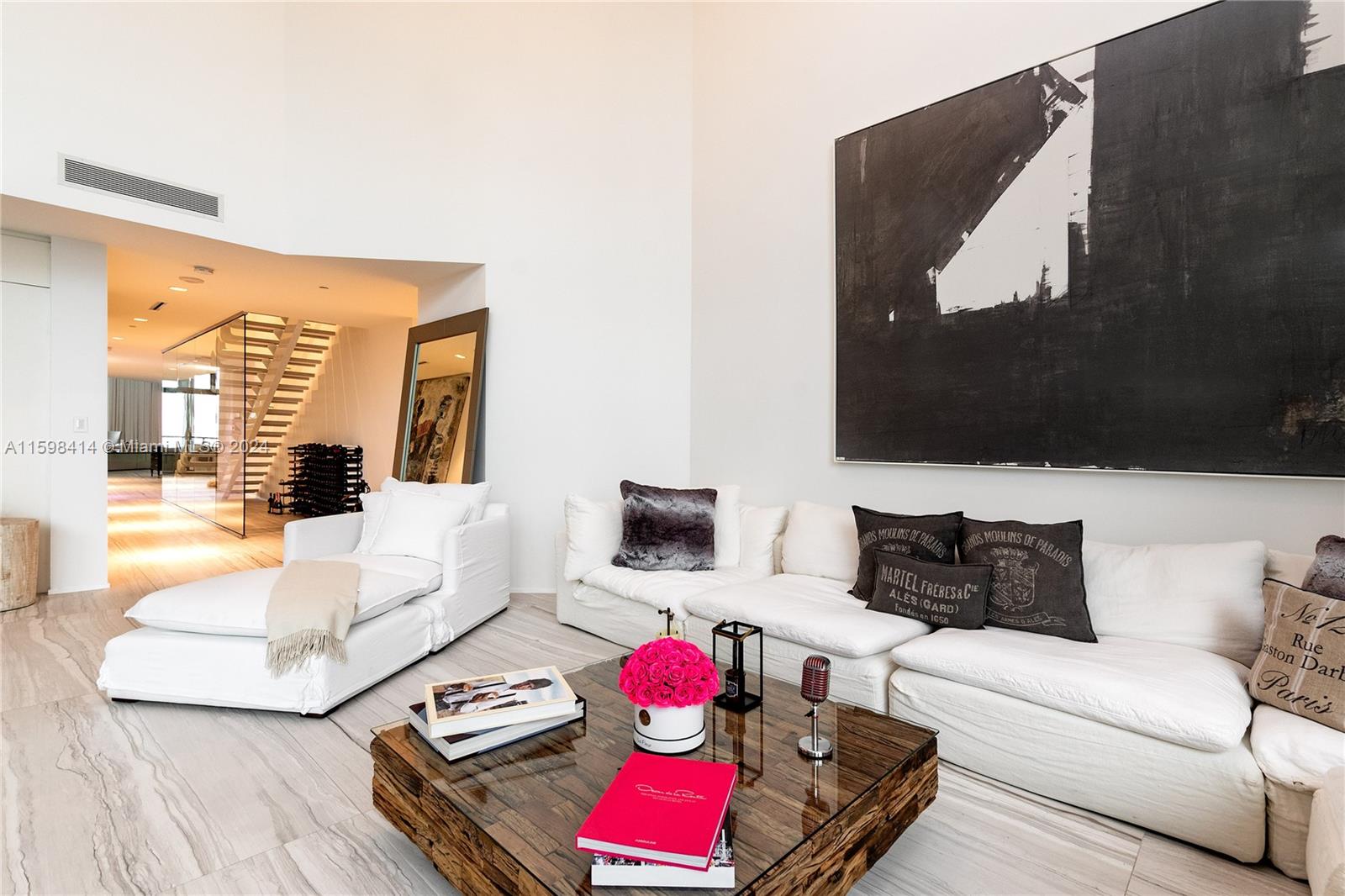 1000 Biscayne Boulevard, Unit TH1002 Miami, FL 33132 - Photo 15 of 27 a living room with furniture and wooden floor