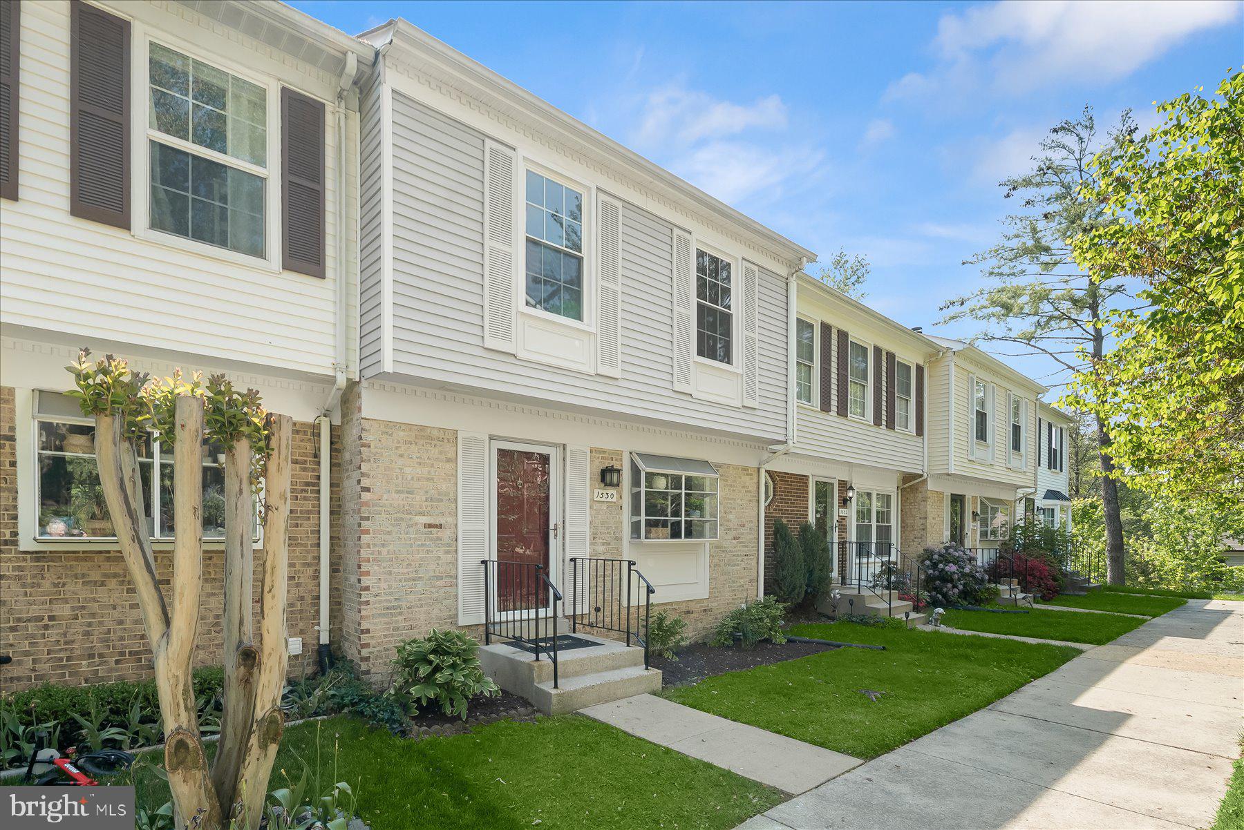 1530 Tanyard Hill Road Gaithersburg, MD 20879 - Photo 1 of 40 a front view of a house with a yard