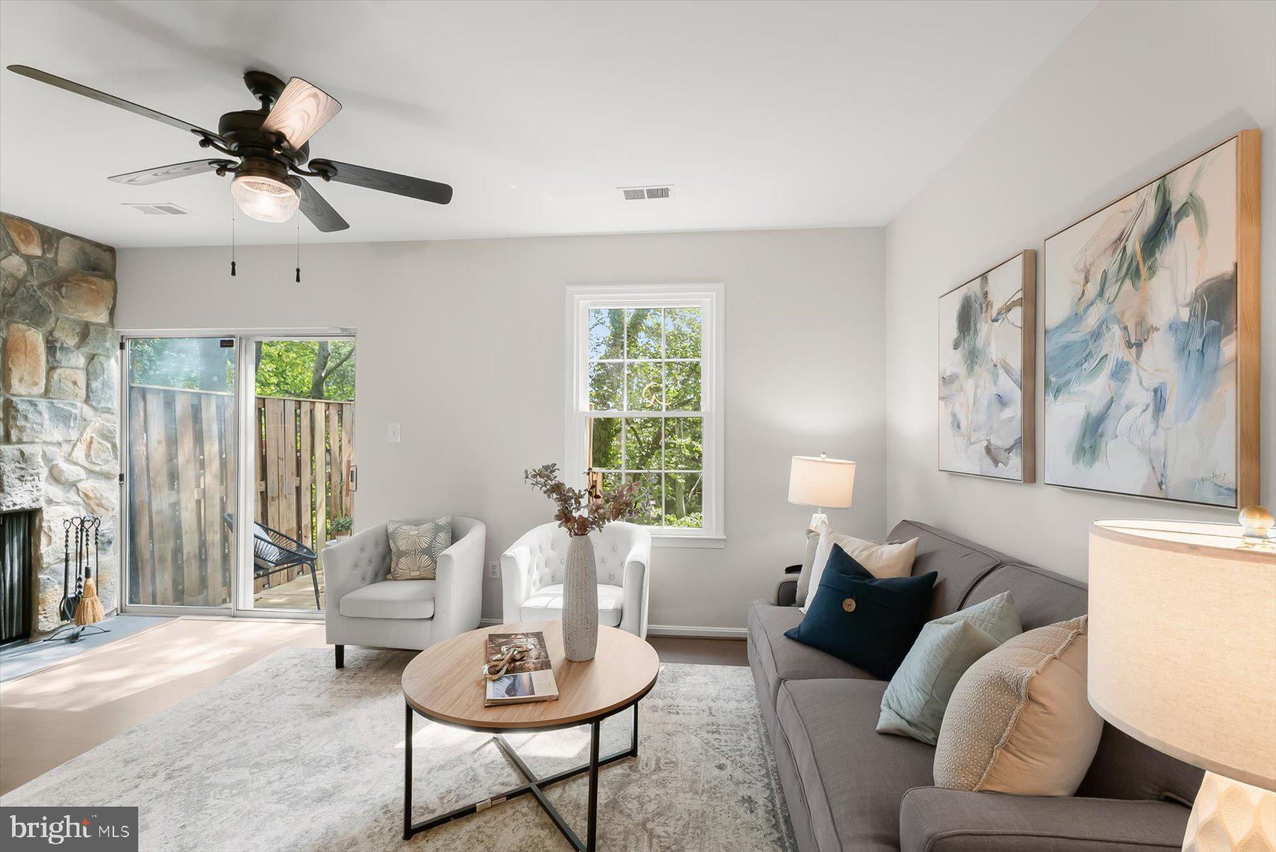 1530 Tanyard Hill Road Gaithersburg, MD 20879 - Photo 12 of 40 a living room with furniture and a large window