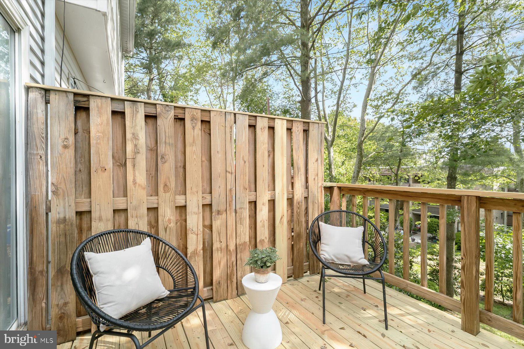 1530 Tanyard Hill Road Gaithersburg, MD 20879 - Photo 17 of 40 a view of a chair and table in the balcony