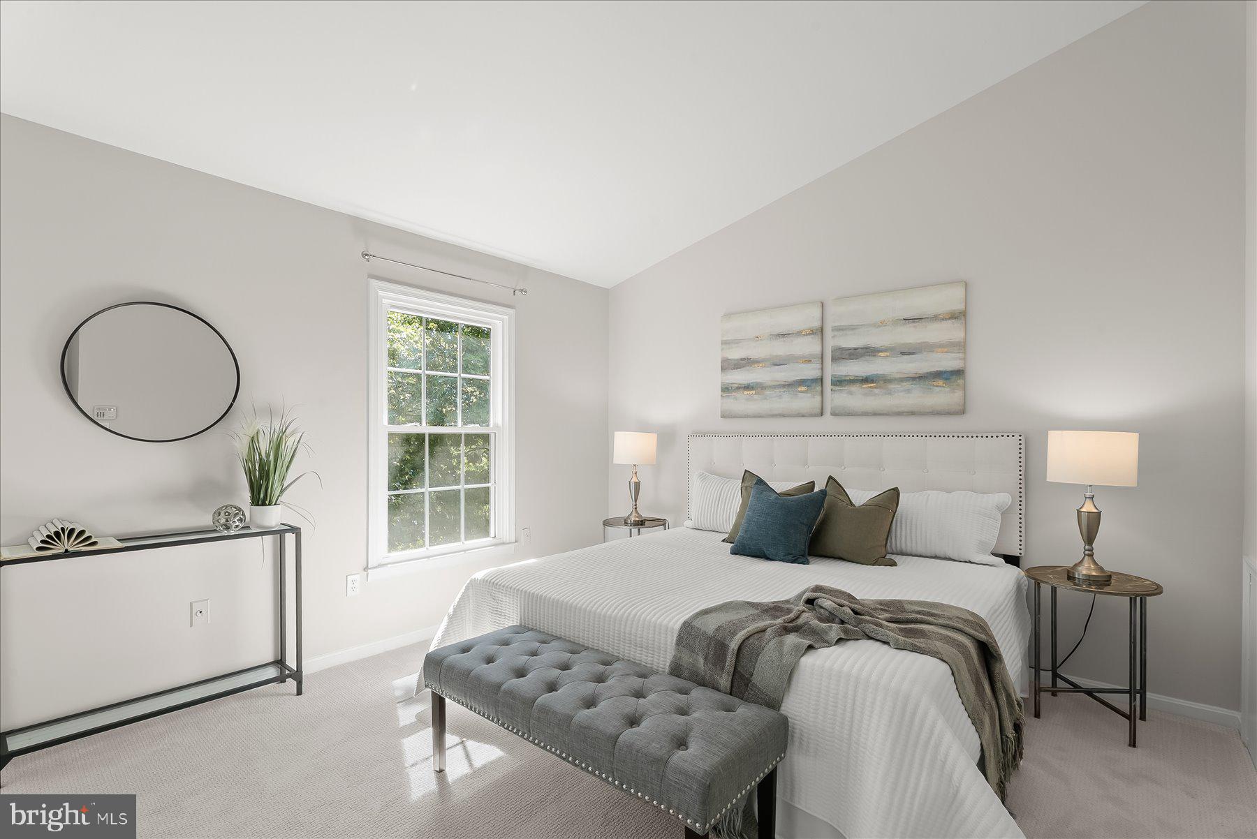 1530 Tanyard Hill Road Gaithersburg, MD 20879 - Photo 20 of 40 a bedroom with a bed and a dresser next to a window