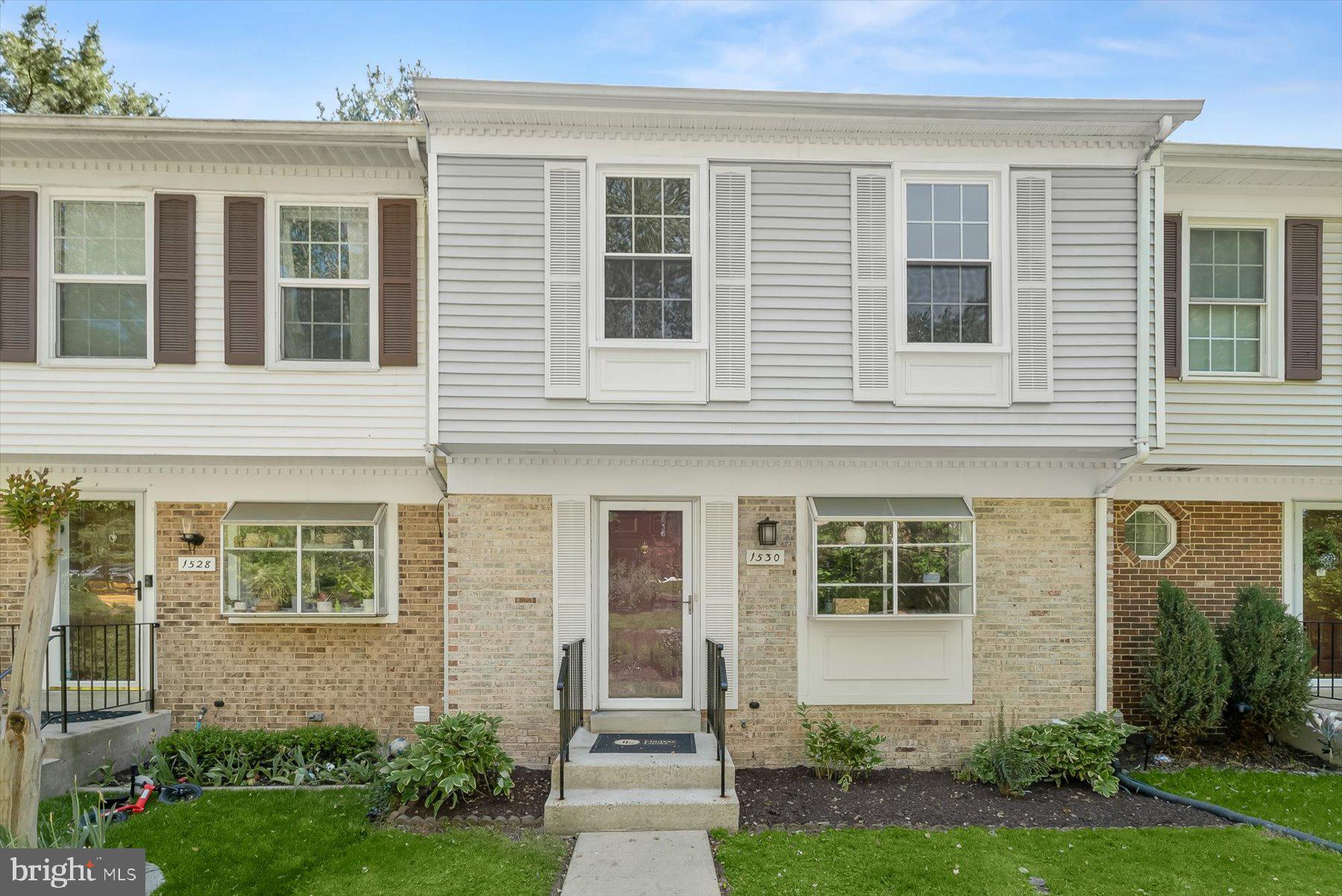 1530 Tanyard Hill Road Gaithersburg, MD 20879 - Photo 2 of 40 front view of a house that has a yard