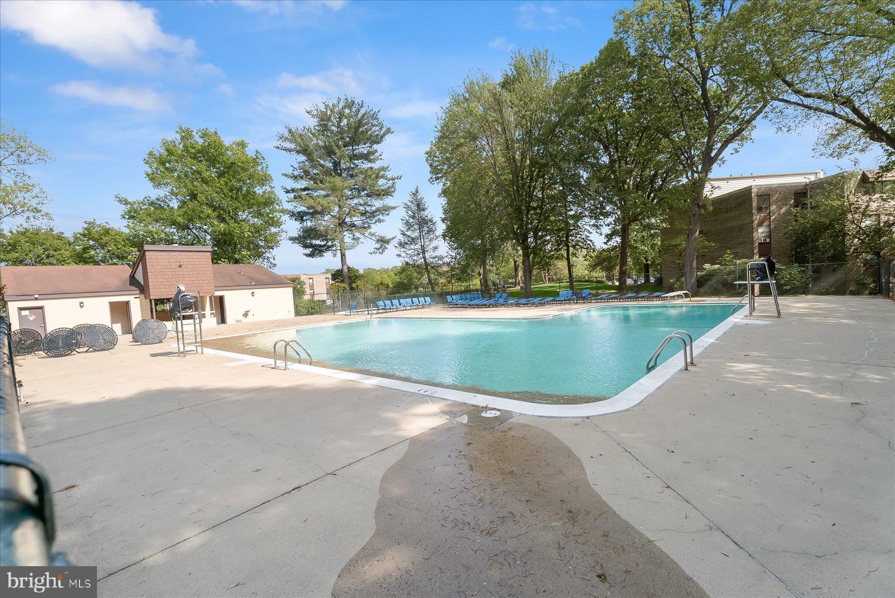 1530 Tanyard Hill Road Gaithersburg, MD 20879 - Photo 37 of 40 a view of a swimming pool and a yard