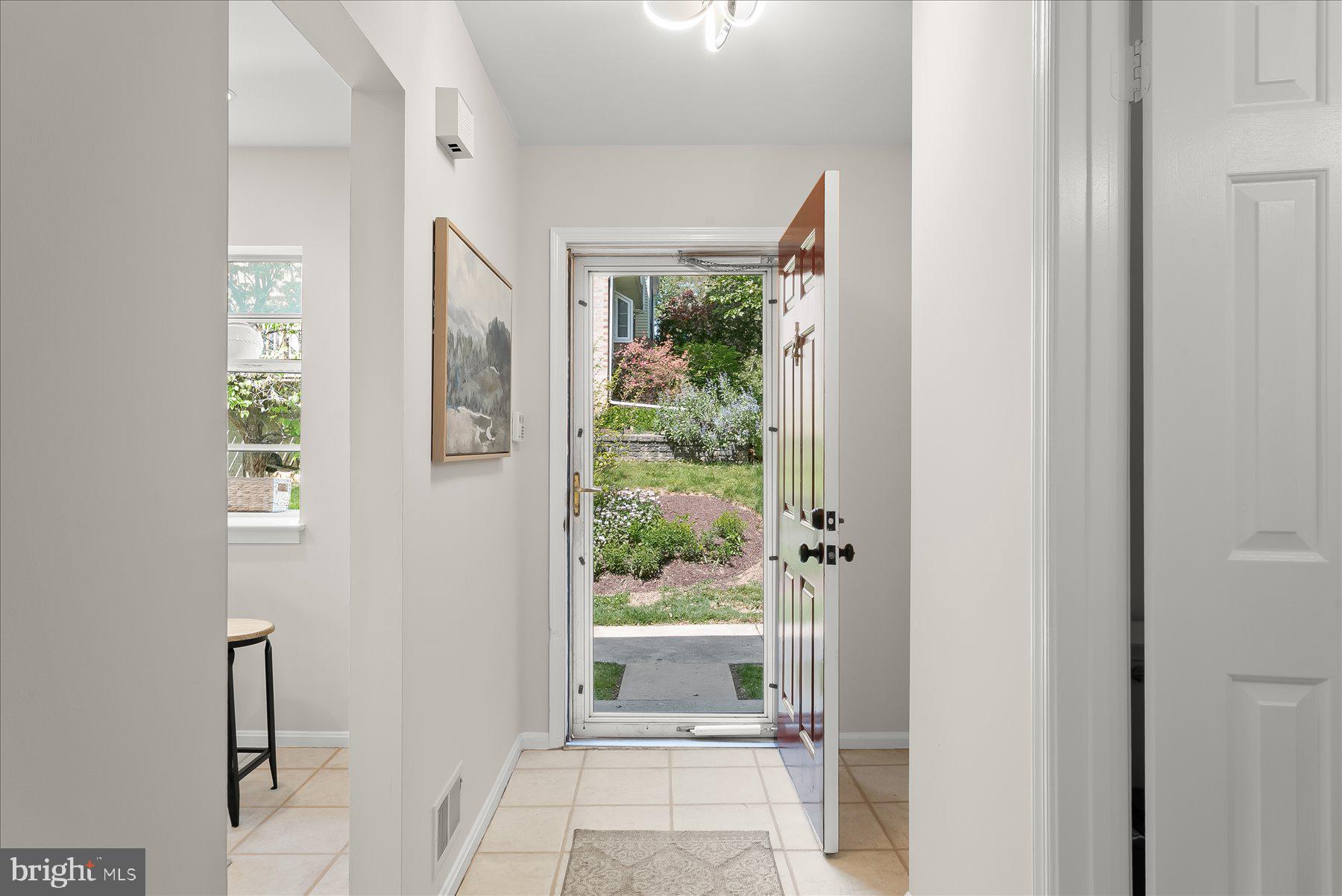 1530 Tanyard Hill Road Gaithersburg, MD 20879 - Photo 4 of 40 a view of a porch with a floor to ceiling window
