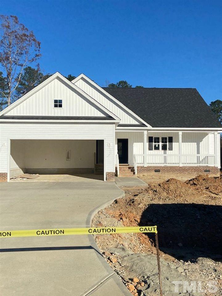 1311 Bill Avery Road Coats, NC 27521 - Photo 3 of 3 a front view of a house with a yard