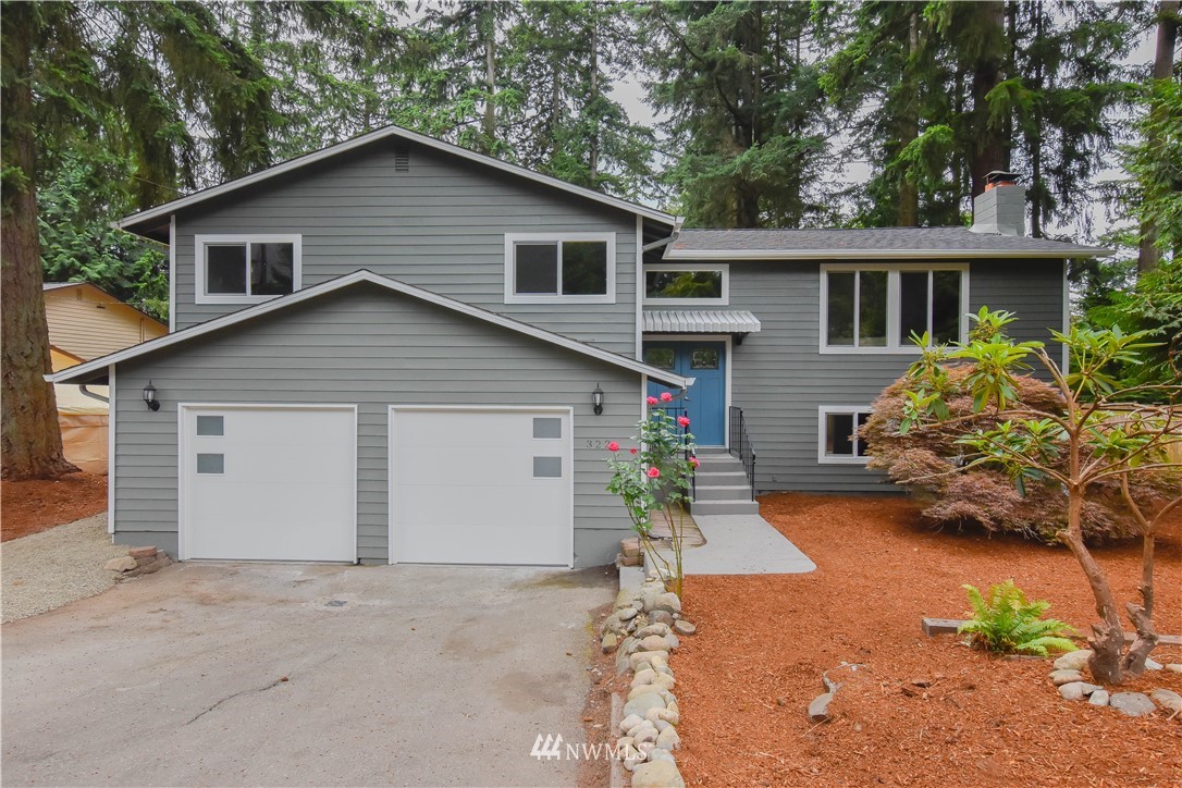 322 170th Place Southwest Bothell, WA 98012 - Photo 1 of 37 a front view of house with yard and green space