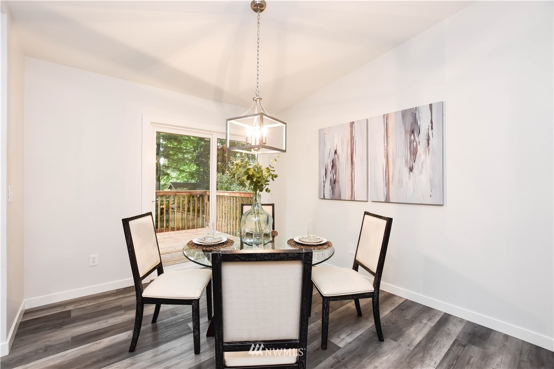 322 170th Place Southwest Bothell, WA 98012 - Photo 18 of 37 a view of a dining room with furniture window and outside view