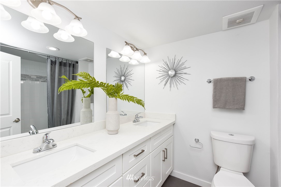 322 170th Place Southwest Bothell, WA 98012 - Photo 20 of 37 a bathroom with a sink a vanity and a mirror