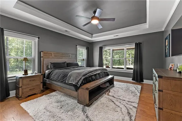 a spacious bathroom with a double vanity sink mirror double and bathtub
