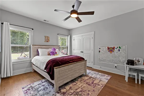 a view of entryway with wooden floor