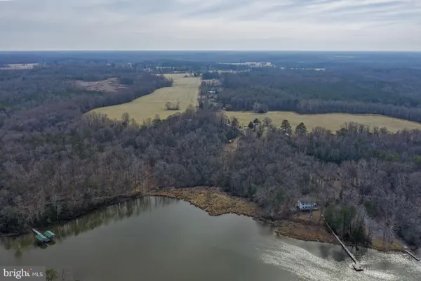 a view of a yard with a lake view