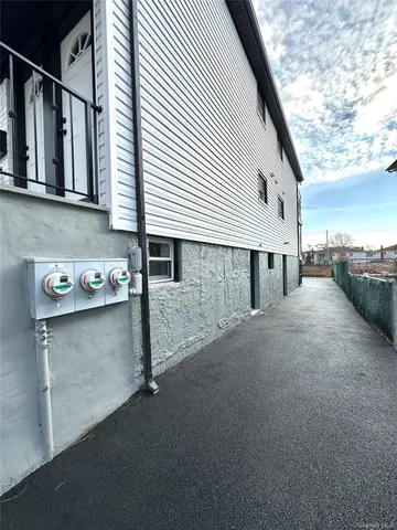 a view of a house with a street