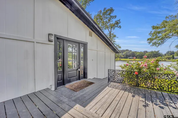 a view of balcony with wooden floor and outdoor space