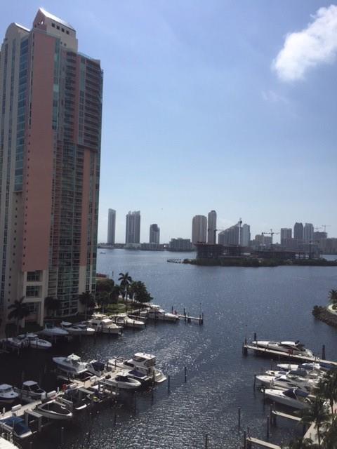 3340 Northeast 190th Street, Unit 1105 Miami, FL 33180 - Photo 11 of 17 a view of a building with lake view