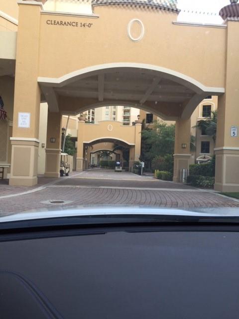 3340 Northeast 190th Street, Unit 1105 Miami, FL 33180 - Photo 6 of 17 a view of car parked from a window