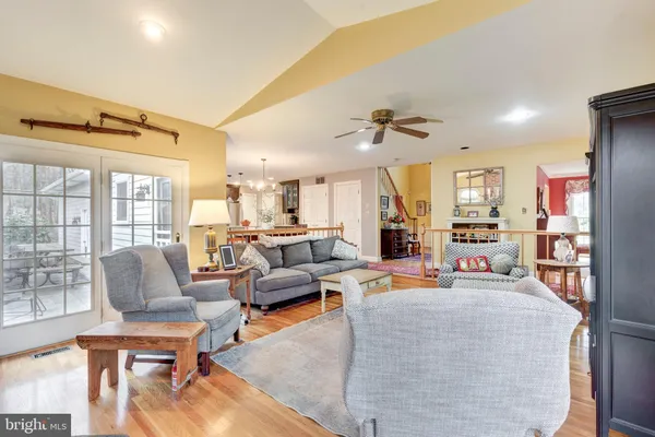 a kitchen with stainless steel appliances granite countertop a refrigerator stove microwave and sink