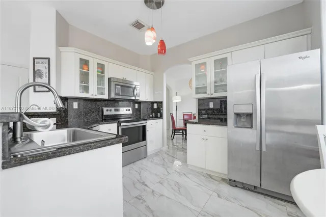 $674,500 | 11324 Northwest 74th Terrace, Doral, FL 33178