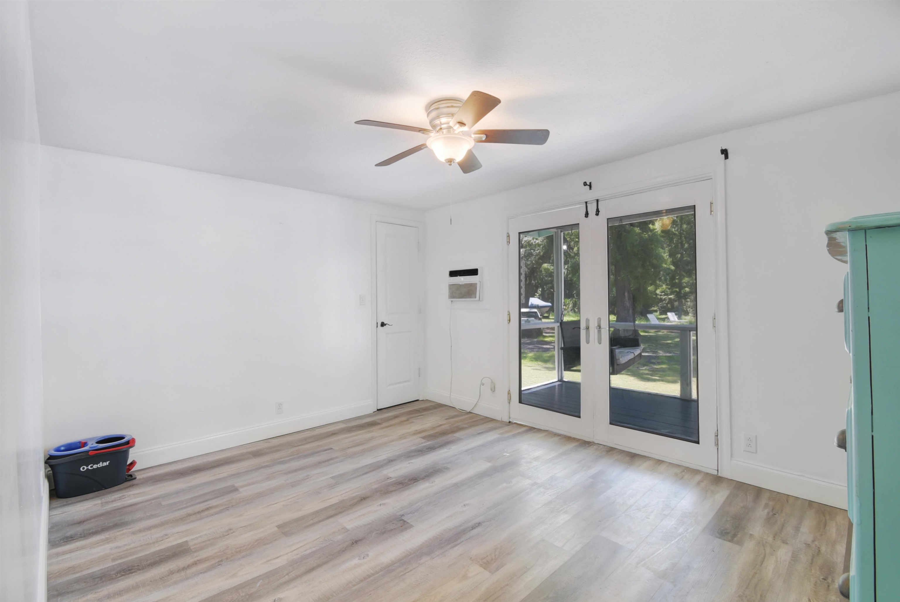 4895 Ave D St. Augustine, FL 32095 - Photo 17 of 25 a view of an empty room with window and wooden floor