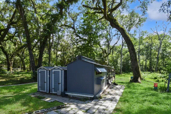 a backyard of a house with lots of green space