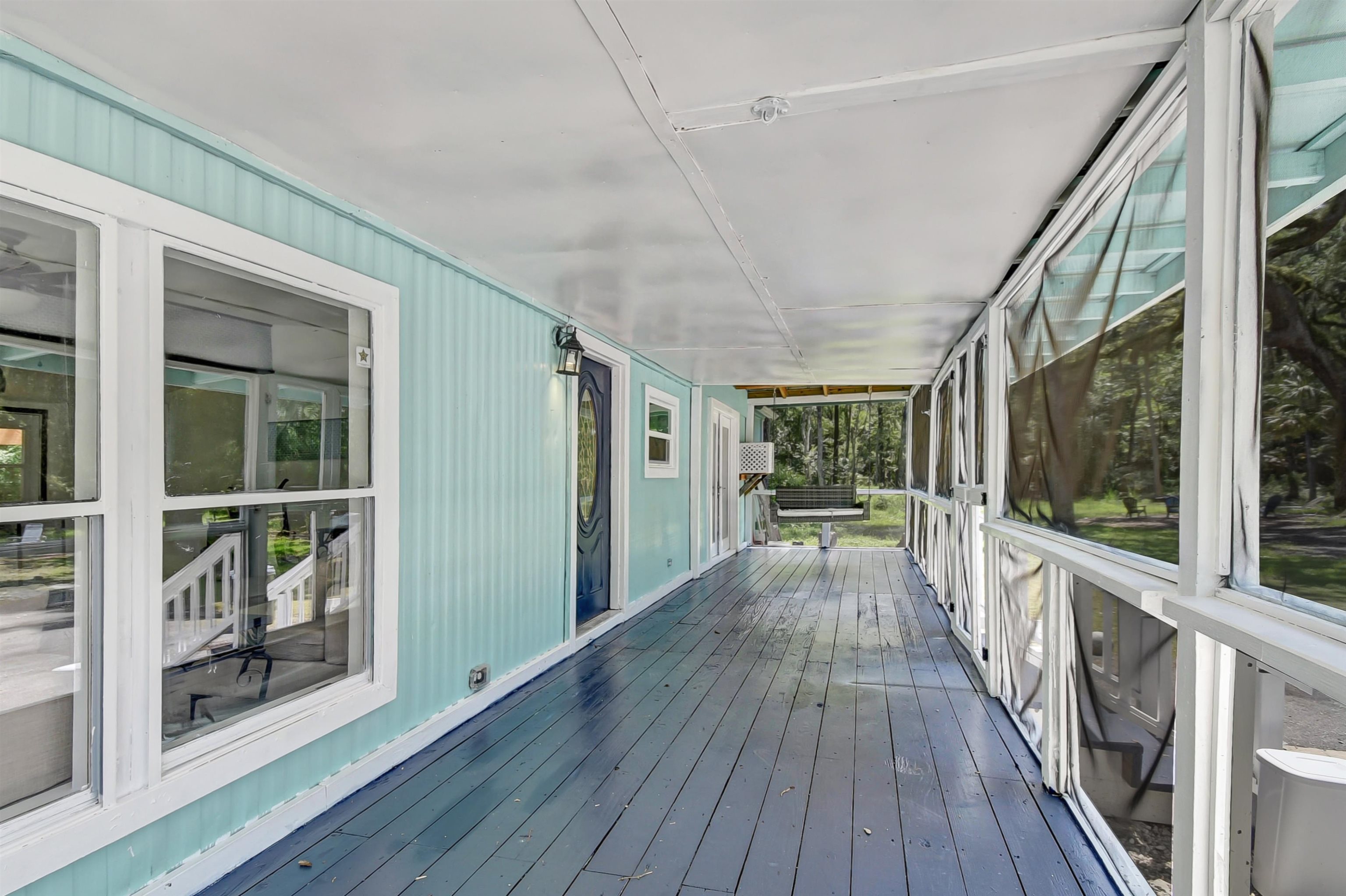 4895 Ave D St. Augustine, FL 32095 - Photo 10 of 25 a view of a house with a porch